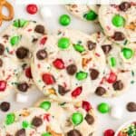 Pile of Christmas cookies with red and green candies, chocolate chips, pretzels; text: "Easy Christmas Cookies from Cake Mix.