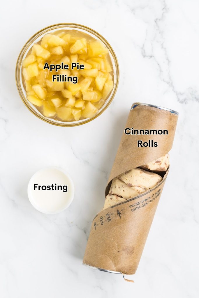 Ingredients for cinnamon roll mini apple pies displayed on counter