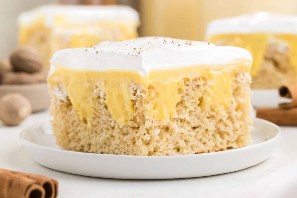 Eggnog poke cake with creamy eggnog pudding filling.