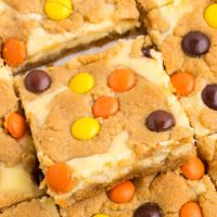 Close up shot of a single Peanut Butter Cookie Cheesecake Bar.