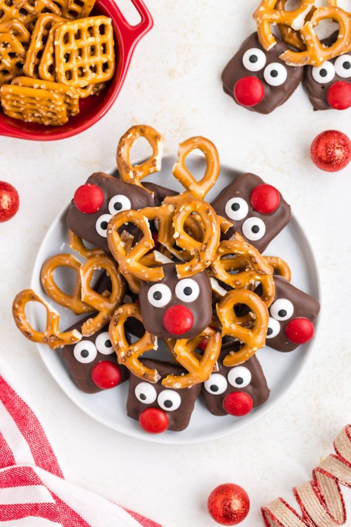 Pretzel Reindeers piled on a plate.
