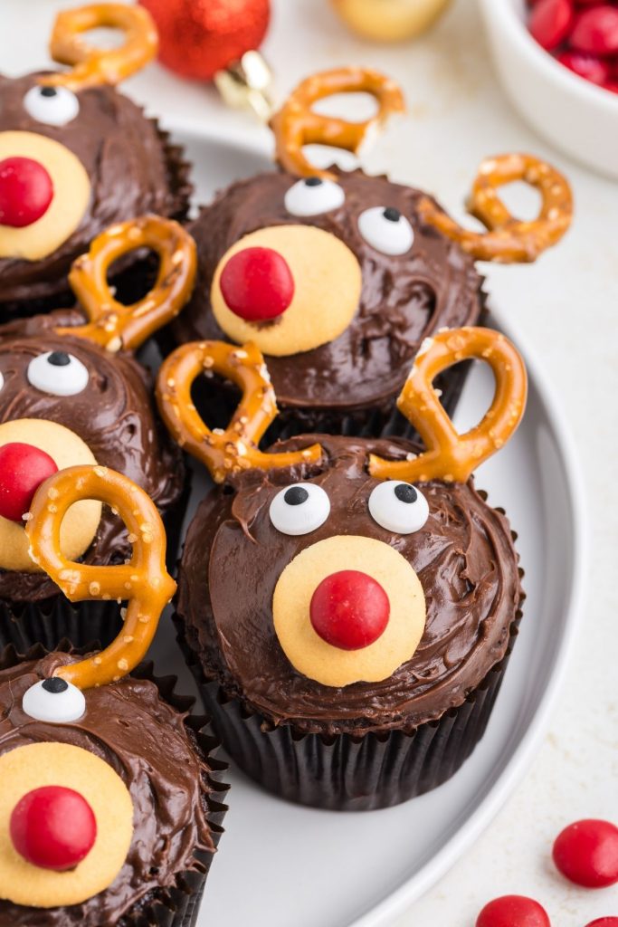 Reindeer cupcakes arranged on a plate.