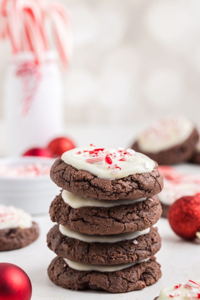 Pile of Peppermint Bark Brownie Cookies on the counter. 