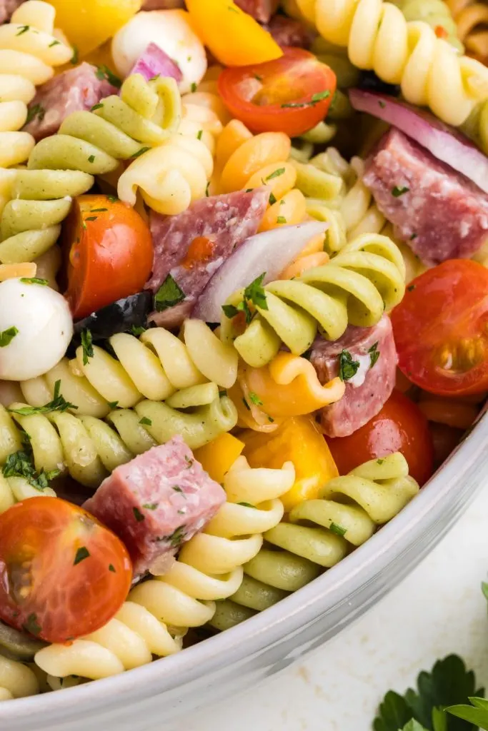 Close-up shot of Italian pasta salad with tri-color rotini pasta.