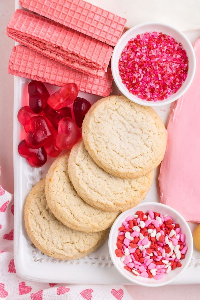 Cookies and sprinkles displayed on the dessert board.