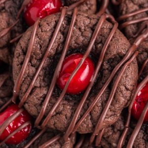 Pile of chocolate covered cherry cookies.