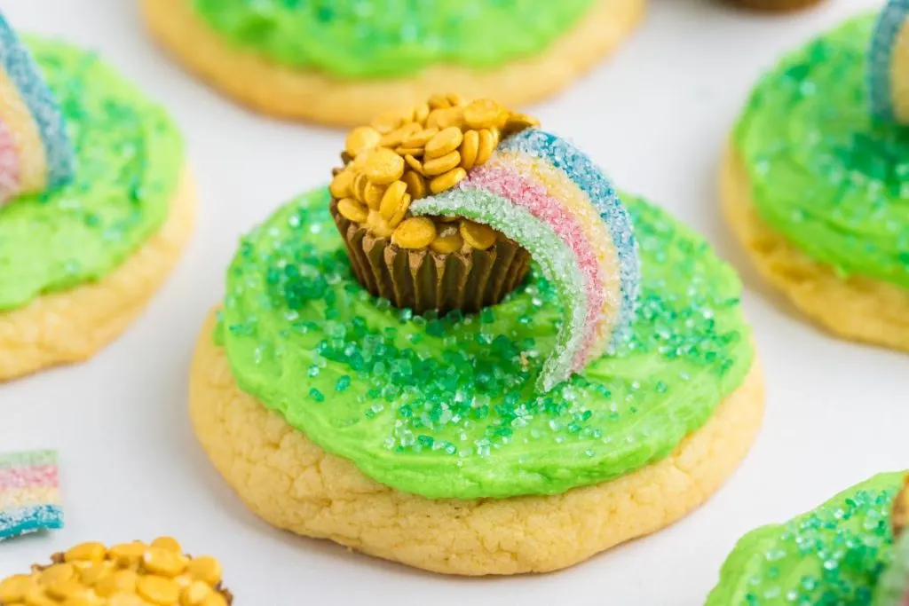 Pot of gold cookies on the counter. 