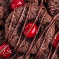 Pile of chocolate covered cherry cookies.