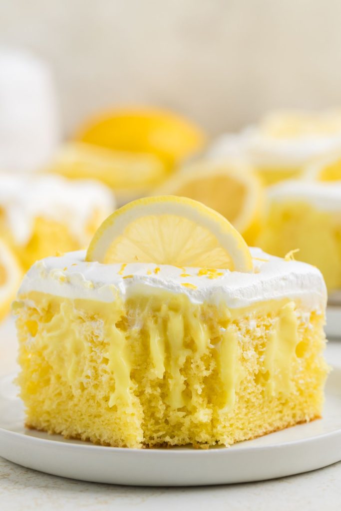 Lemon cake with creamy pudding dripping down.