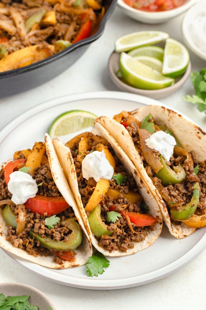 Ground beef fajitas with onions and pepper in flour tortillas.