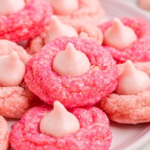 Strawberry Kiss cake mix cookies piled on a plate.