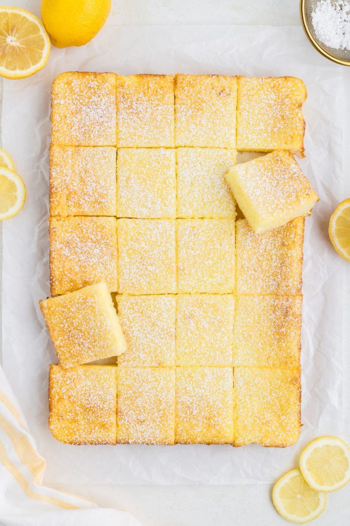2-ingredient lemon bars cut into pieces and laid out on the counter.