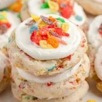 Stack of three fruity pebble cookies made from cake mix.