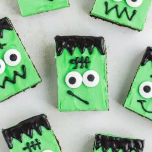 Frankenstein cake mix chocolate cookie bars arranged on the counter.