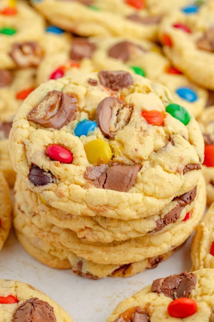 Halloween candy cookies piled on the counter.