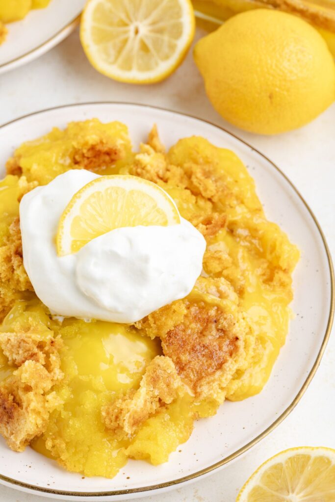 Plate of lemon dump cake with lemon pie filling and cake mix.