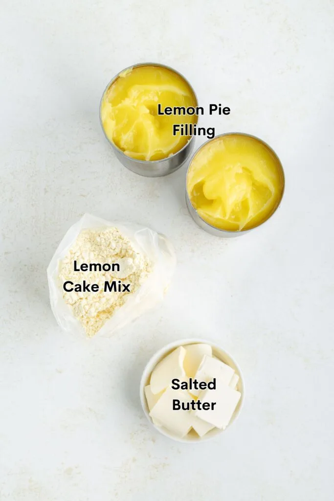 Ingredients such as canned lemon pie filling, lemon cake mix, and butter.