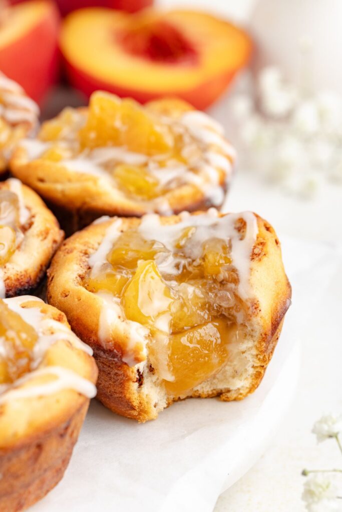 Mini peach pies with cinnamon roll crust.