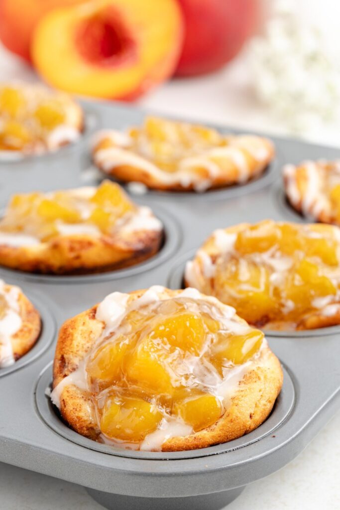 Muffin pan cinnamon roll peach pies.