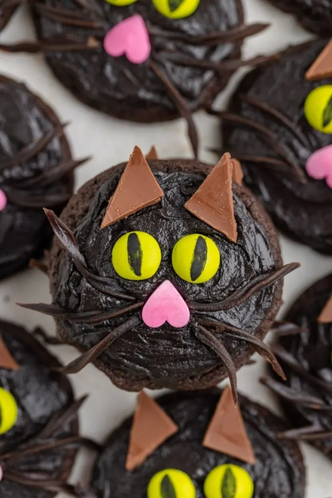 Black cat cake mix cookies with licorice whiskers.