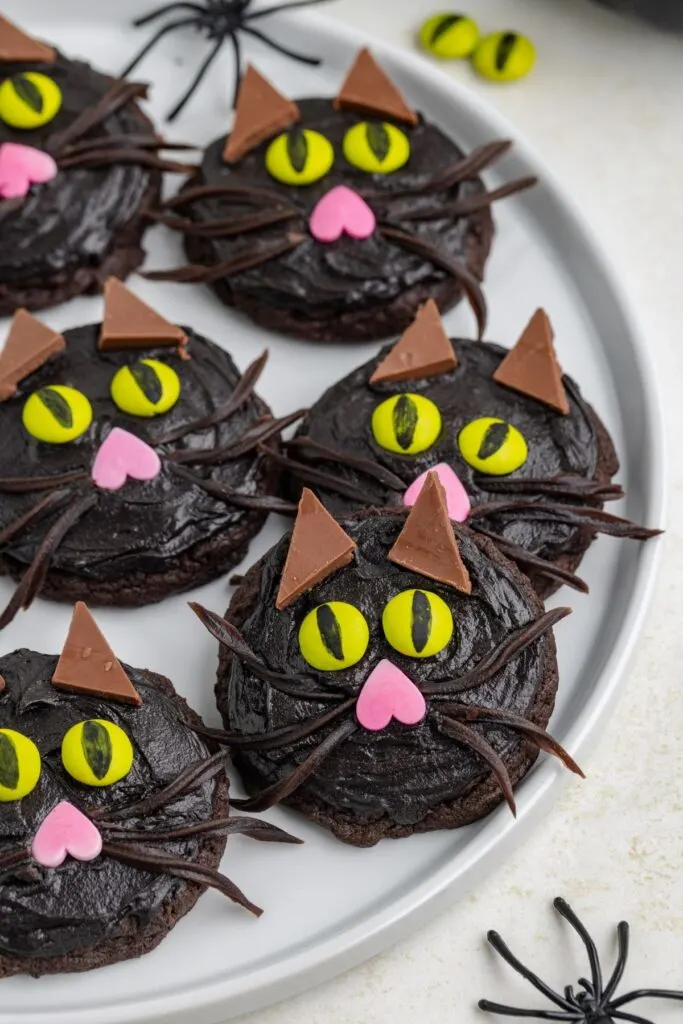 Cute cat cookies with black frosting.