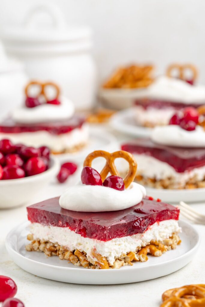 Cranberry pretzel salad with whole berry cranberry sauce.