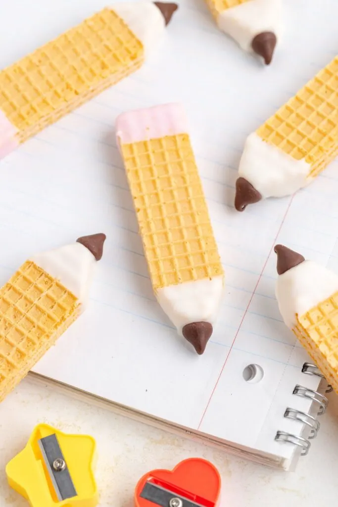 Wafer cookies on a ruled notebook.