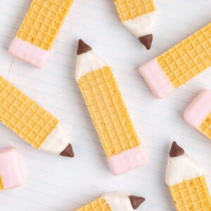 Pencil wafer cookies with pink eraser ends.