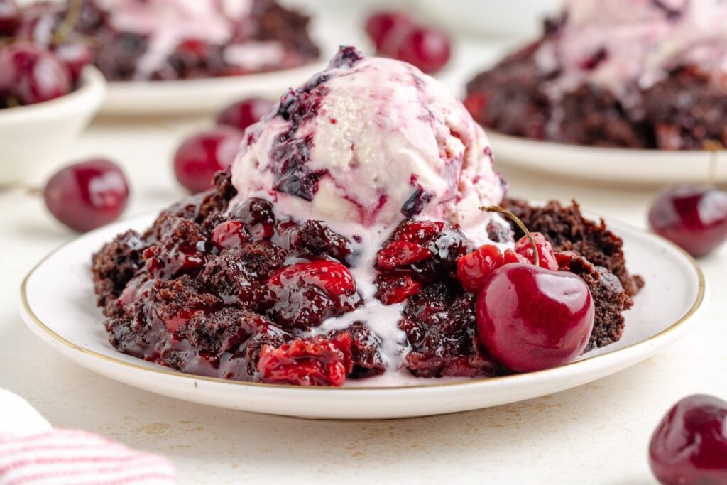 Plate of slow cooker cherry chocolate dump cake.