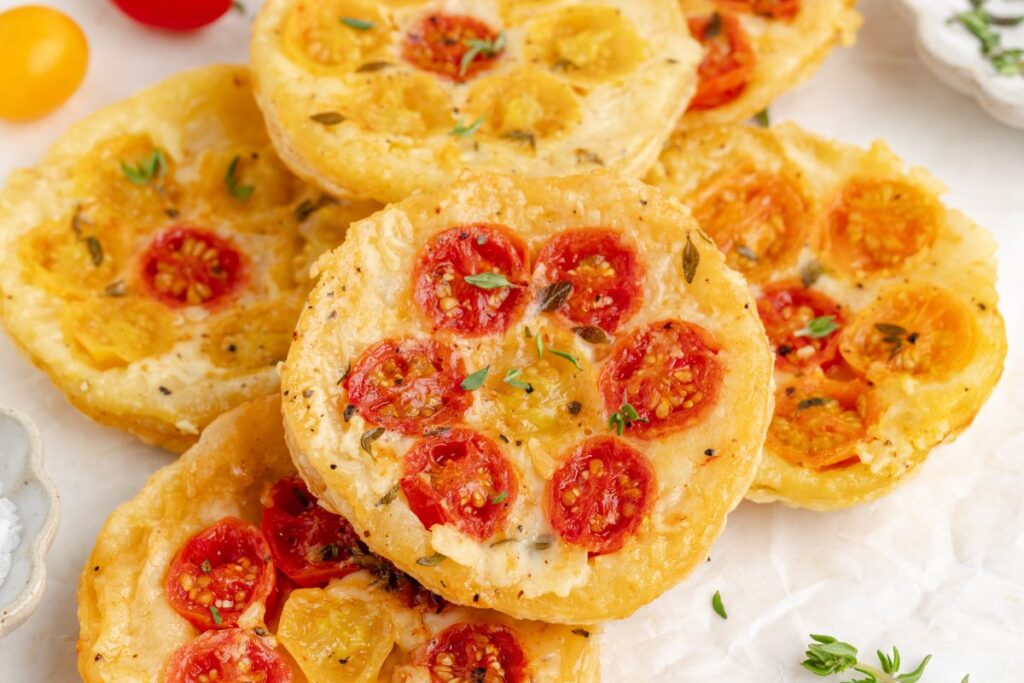 Tomato and gruyere cheese upside down puff pastry tarts.