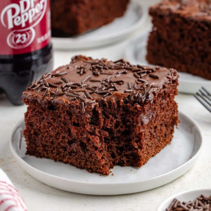 Slice of Dr Pepper cake with a forkful of cake removed.