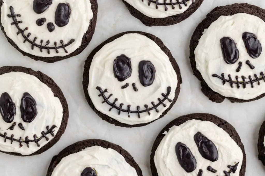 Chocolate Jack Skellington cookies with white chocolate buttercream.