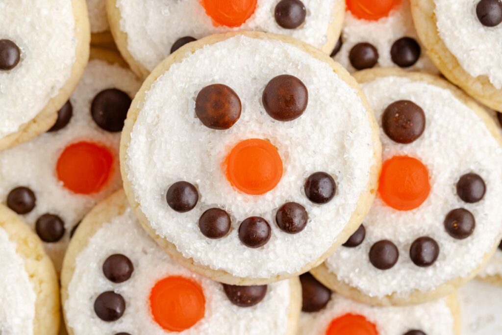 Pile of snowman face cake mix cookies.