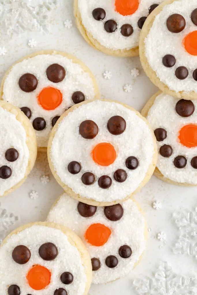 Cute snowman face cake mix cookies with buttercream frosting.