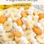 Bowl of Banana Pudding Fluff topped with banana slices, marshmallows, wafers, and a six-ingredient recipe text overlay.