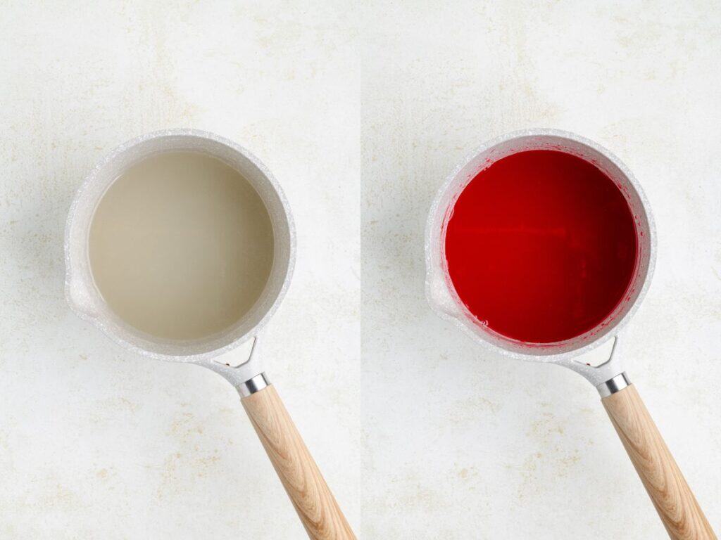 Two saucepans side by side, one with clear liquid, one with bright red liquid, on light surface.