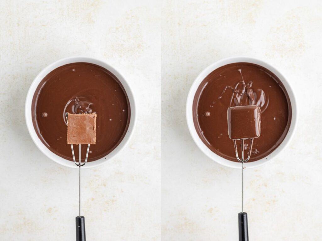 A fork holds cool whip candy before and after dipping in melted chocolate, positioned above a bowl of chocolate.