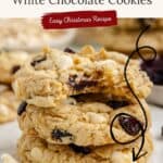 A stack of cranberry oatmeal white chocolate cookies with chips and cranberries; text highlights an easy Christmas recipe.