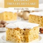 A slice of Eggnog Tres Leches Cake with whipped cream on a white plate, festive spices nearby, text overlay present.