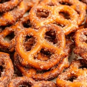 Close-up of pretzels dusted with cinnamon and sugar.