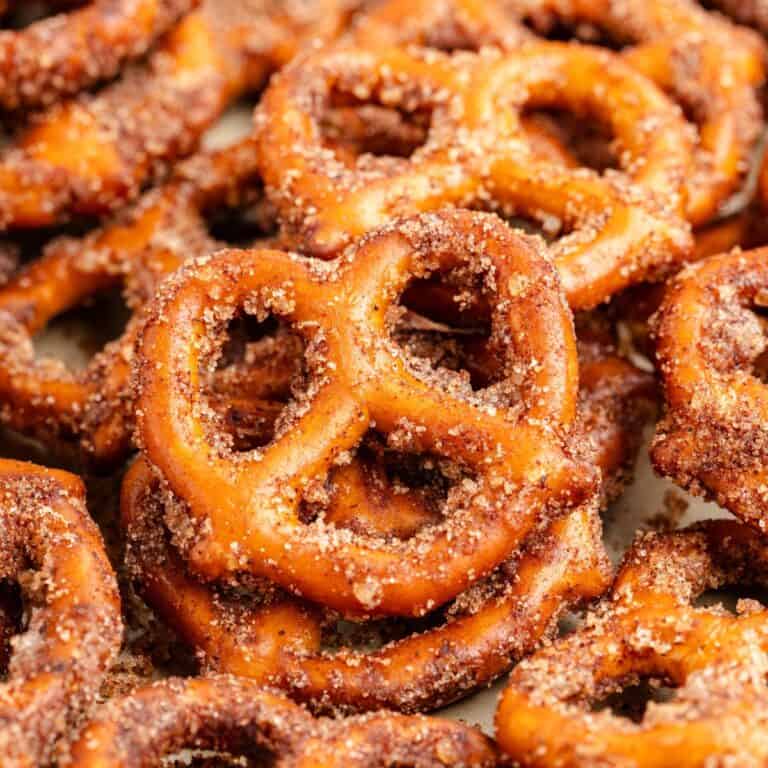 Close-up of pretzels dusted with cinnamon and sugar.