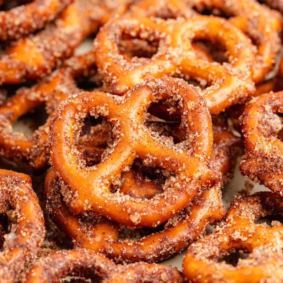 Close-up of pretzels dusted with cinnamon and sugar.