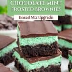 Stacked mint brownies with a green mint layer and glossy chocolate topping, made from a boxed mix.