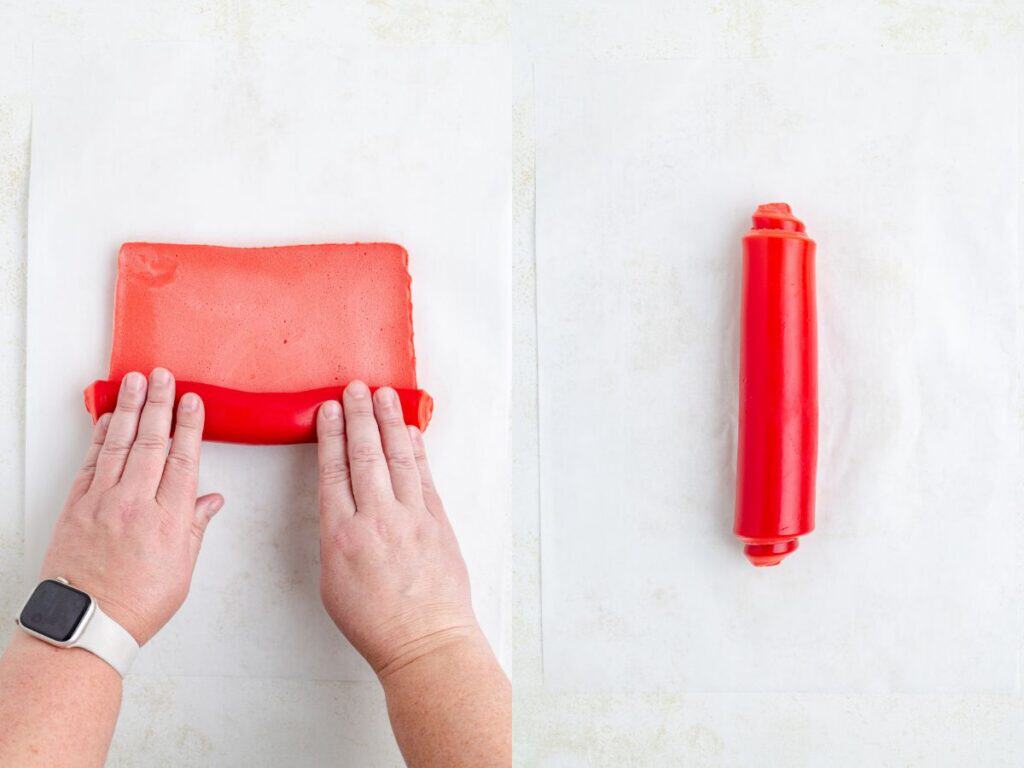 Hands roll red jello on parchment, with a finished roll on the right.