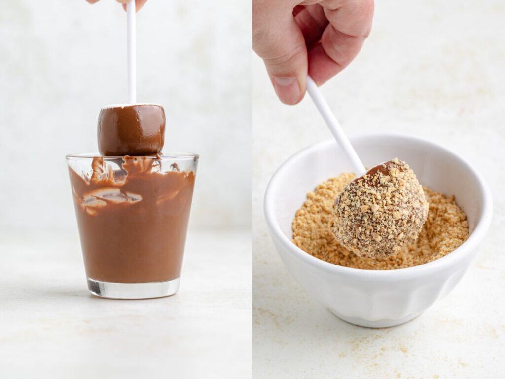 Marshmallow on stick dipped in chocolate, then rolled in crushed graham crackers in white bowl.